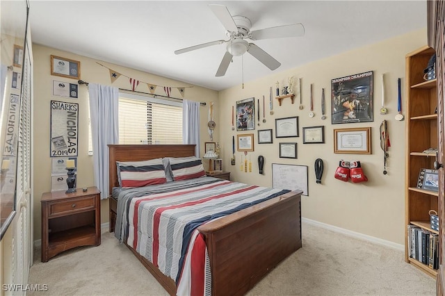 carpeted bedroom with ceiling fan