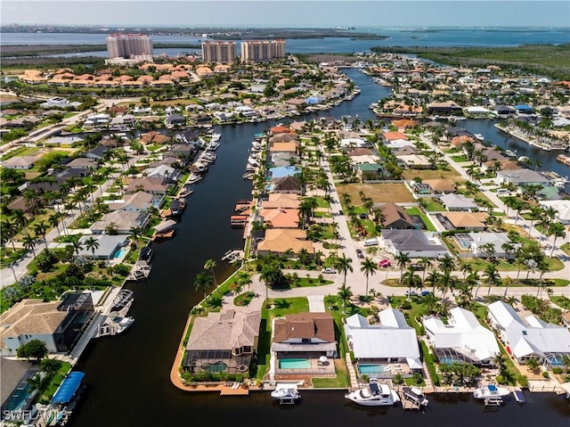 drone / aerial view with a water view