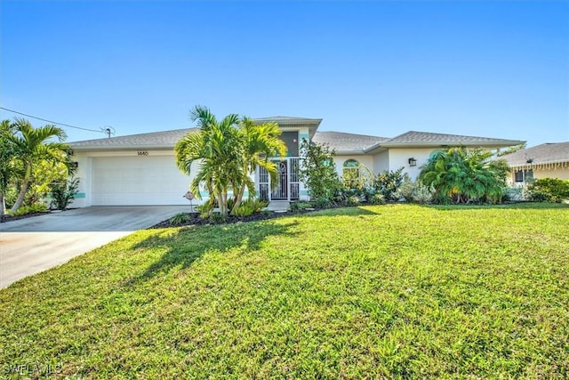 ranch-style house with a front yard and a garage