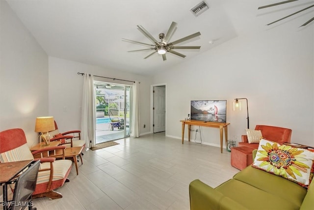 living room with lofted ceiling and ceiling fan