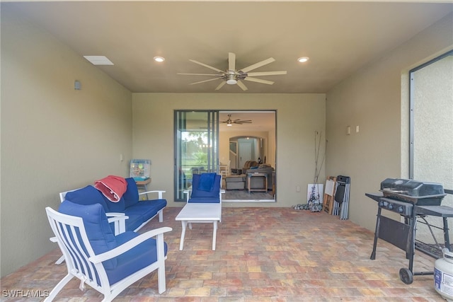 view of patio / terrace featuring ceiling fan and area for grilling