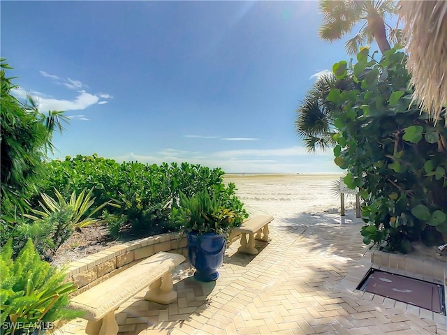 view of patio / terrace featuring a water view