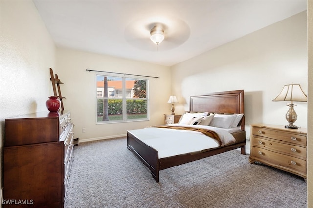 bedroom with ceiling fan and carpet flooring