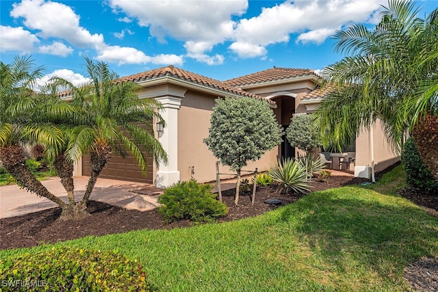 exterior space with a garage and a front lawn