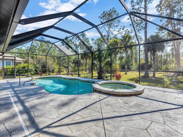 view of swimming pool featuring an in ground hot tub, a patio, and glass enclosure