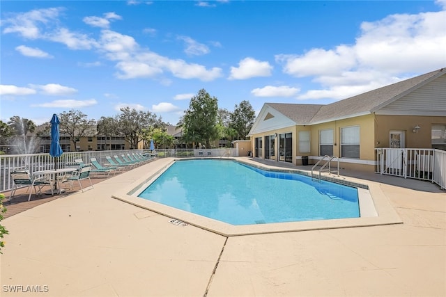 view of pool with a patio area