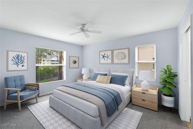 carpeted bedroom with ceiling fan