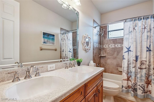 full bathroom with tile patterned flooring, shower / bath combination with curtain, vanity, and toilet