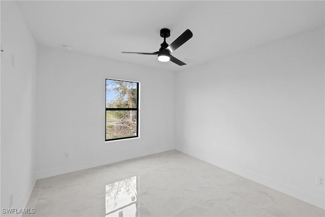 unfurnished room with ceiling fan