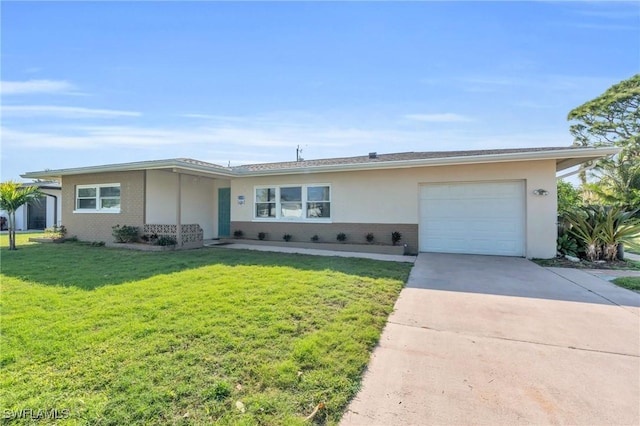 ranch-style home featuring a front yard and a garage