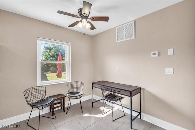 office area featuring light tile patterned floors and ceiling fan