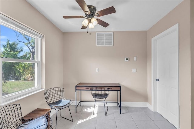 interior space featuring ceiling fan and light tile patterned flooring