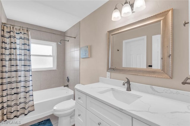 full bathroom featuring tile patterned floors, shower / bath combo, toilet, and vanity