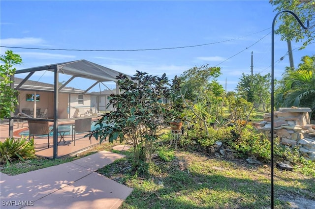 exterior space featuring a patio area and a pool