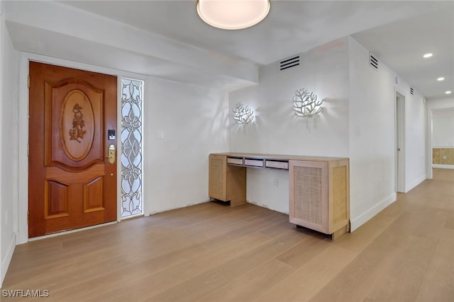 foyer with light hardwood / wood-style flooring