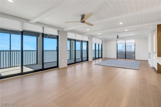 interior space with ceiling fan, recessed lighting, beam ceiling, and light wood-style floors