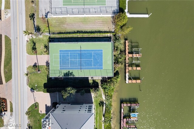 birds eye view of property featuring a water view