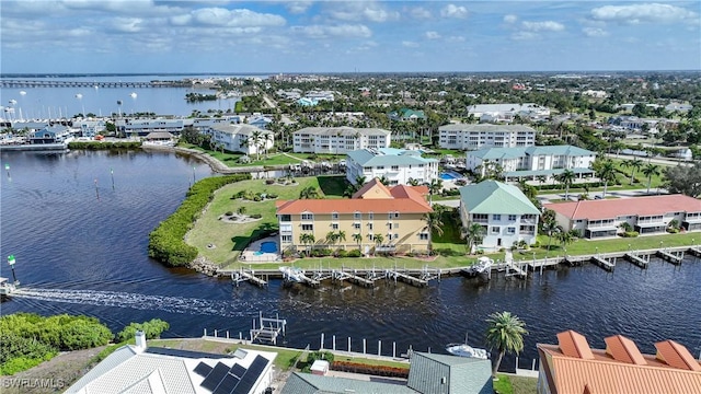 drone / aerial view with a water view