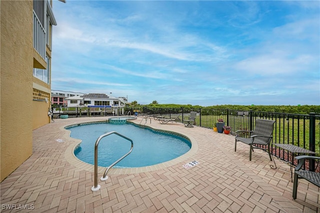 view of pool with a patio area