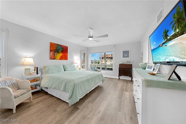 bedroom featuring ceiling fan and light wood-type flooring