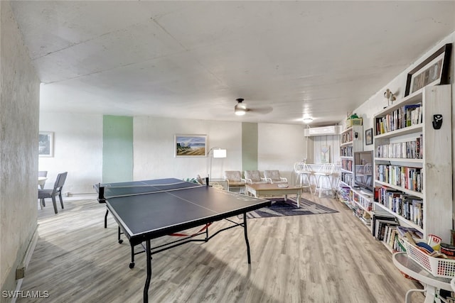 rec room featuring ceiling fan and light hardwood / wood-style flooring