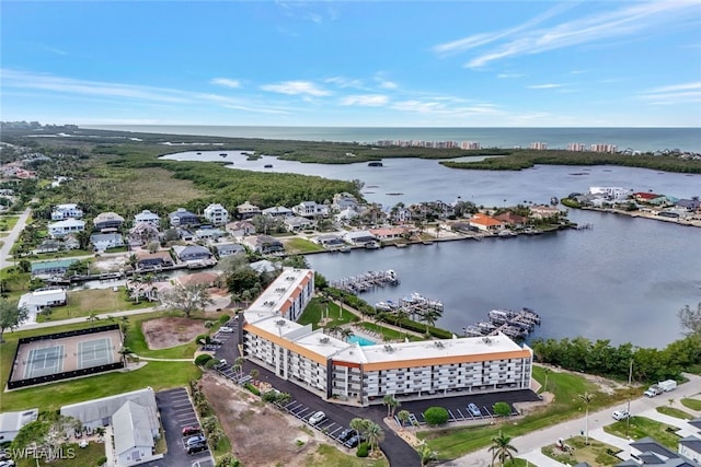 bird's eye view with a water view