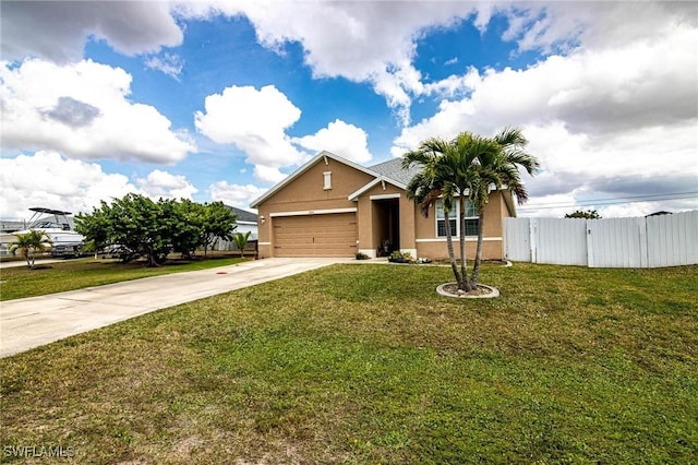 view of front of property with a garage and a front yard