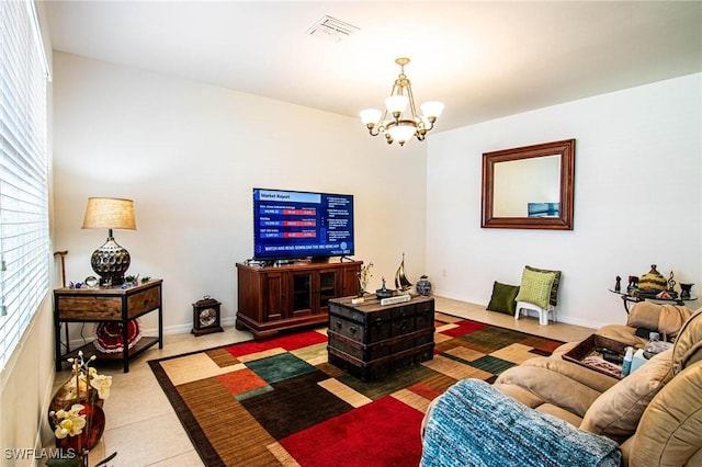 living room with a notable chandelier