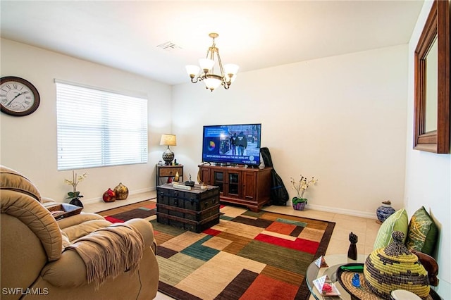 tiled living room featuring a chandelier