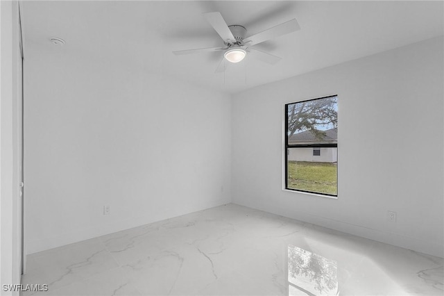 unfurnished room with ceiling fan