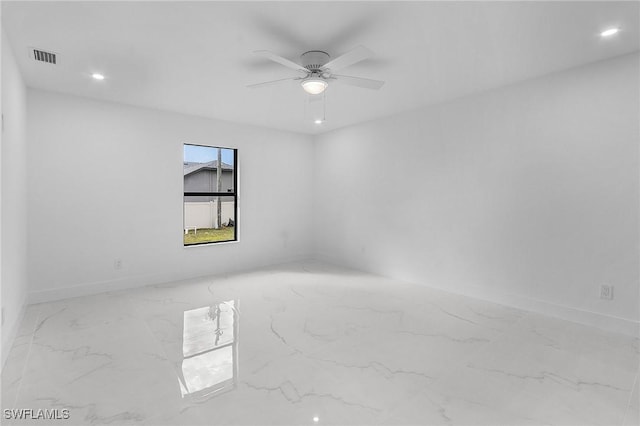 empty room featuring ceiling fan