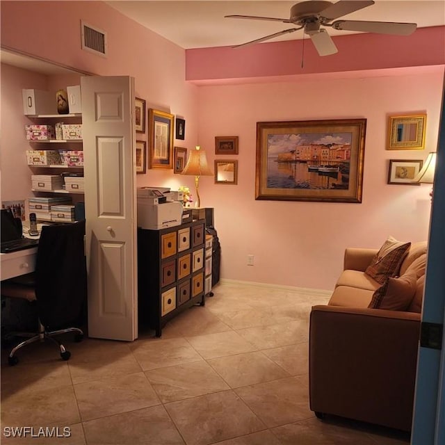 office space with ceiling fan and light tile patterned floors