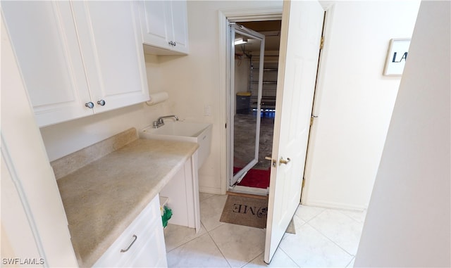 bathroom featuring tile patterned flooring