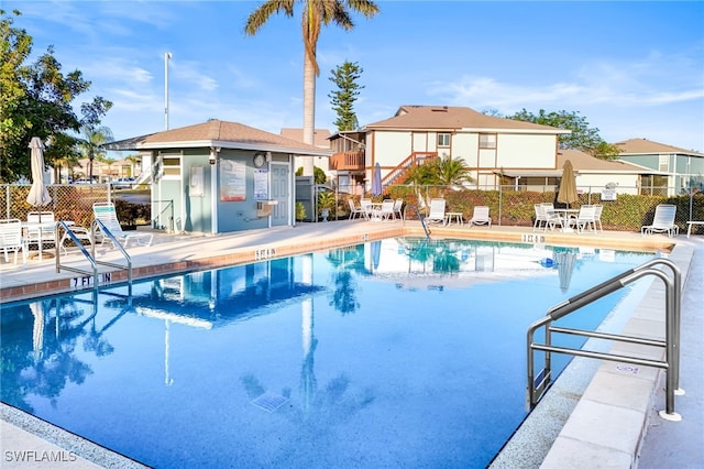 view of pool featuring a patio area