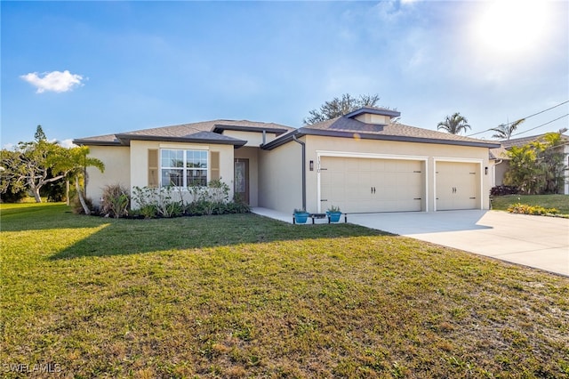 view of front of home with a garage and a front yard