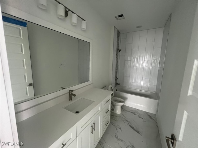 full bathroom with tiled shower / bath combo, vanity, and toilet