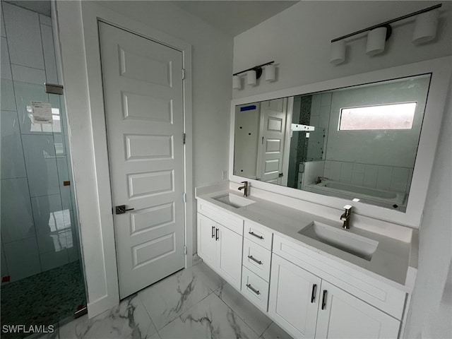 bathroom with vanity and separate shower and tub