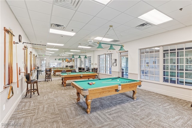 rec room featuring a paneled ceiling, a healthy amount of sunlight, and billiards