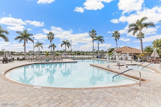 view of pool featuring a patio