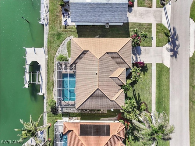 bird's eye view with a water view