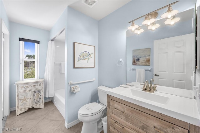 full bathroom with tile patterned flooring, shower / bath combination with curtain, vanity, and toilet