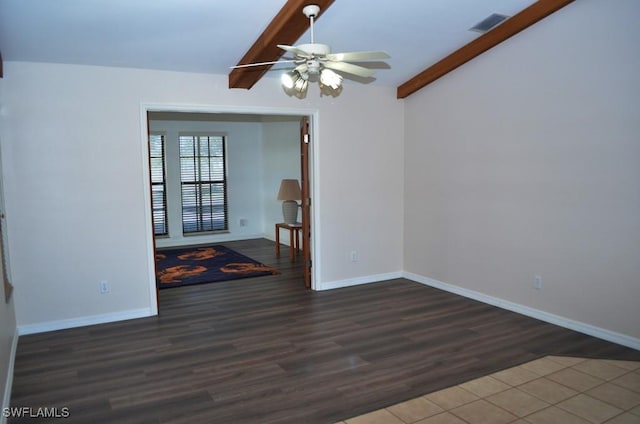 unfurnished room featuring lofted ceiling with beams, ceiling fan, and dark hardwood / wood-style floors