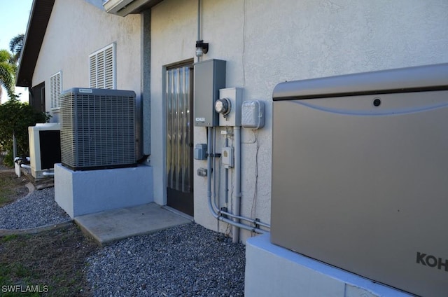 doorway to property featuring cooling unit