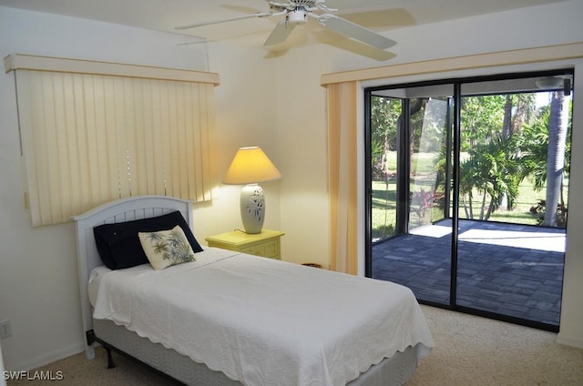 carpeted bedroom with ceiling fan and access to outside