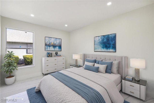 bedroom with light hardwood / wood-style flooring