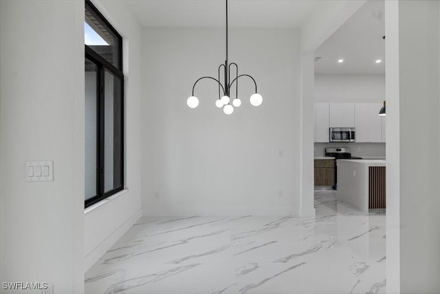 dining area with a notable chandelier