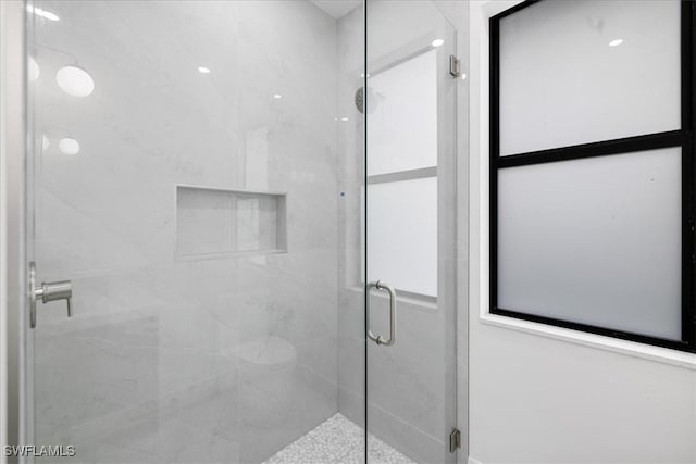 bathroom featuring walk in shower