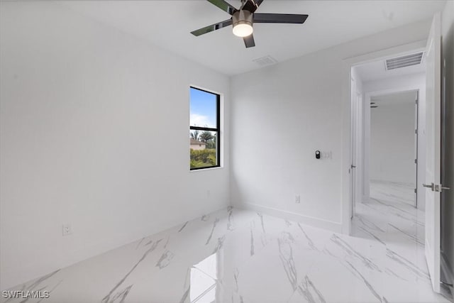 unfurnished room with ceiling fan