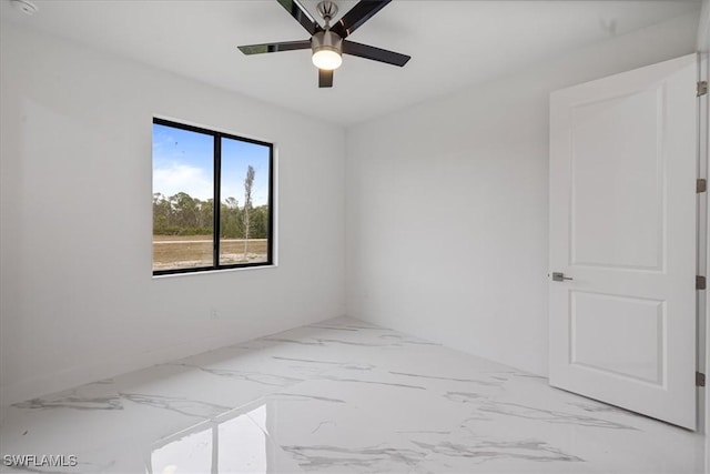 unfurnished room featuring ceiling fan