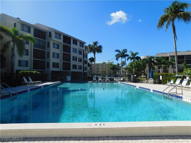 view of swimming pool with a patio